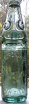 M. V. COMPANY AND HORONDA BREWERY EMBOSSED BEER BOTTLE