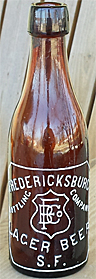 FREDERICKSBURG BOTTLING COMPANY LAGER BEER EMBOSSED BEER BOTTLE