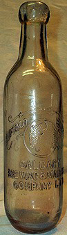 CALGARY BREWING & MALTING COMPANY LIMITED EMBOSSED BEER BOTTLE