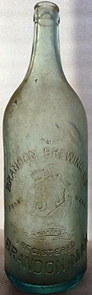 THE BRANDON BREWING COMPANY LIMITED EMBOSSED BEER BOTTLE
