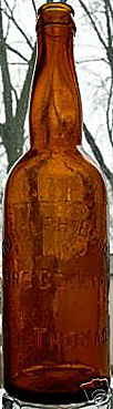 RUDOLPH BEGG BREWING COMPANY LIMITED EMBOSSED BEER BOTTLE