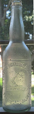 CALCUTT BREWING & MALTING COMPANY EMBOSSED BEER BOTTLE