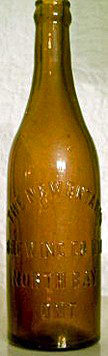 THE NEW ONTARIO BREWING COMPANY LIMITED EMBOSSED BEER BOTTLE