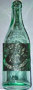 NEEF BROTHERS BREWING COMPANY EMBOSSED BEER BOTTLE