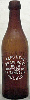FERD HEIM BREWING COMPANY BEER EMBOSSED BEER BOTTLE