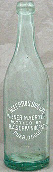NEEF BROTHERS BREWING COMPANY EMBOSSED BEER BOTTLE