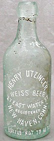 HENRY UTZINGER WEISS BEER EMBOSSED BEER BOTTLE