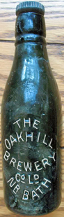 THE OAKHILL BREWERY LIMITED EMBOSSED BEER BOTTLE