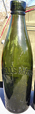 SHOWELL'S BREWERY COMPANY LIMITED EMBOSSED BEER BOTTLE