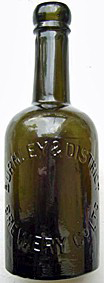 BURNLEY & DISTRICT BREWERY COMPANY LIMITED EMBOSSED BEER BOTTLE