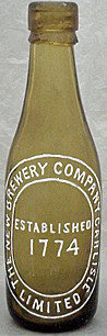 THE NEW BREWERY COMPANY CARLISLE LIMITED EMBOSSED BEER BOTTLE
