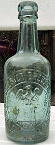 THE COLCHESTER BREWING COMPANY LIMITED EMBOSSED BEER BOTTLE