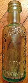 W. G. JOHNSTONE & COMPANY OLD BREWERY EMBOSSED BEER BOTTLE
