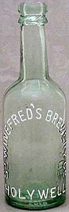 ST. WINEFRED'S BREWERY COMPANY EMBOSSED BEER BOTTLE