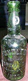 HUNDLEBY BREWERY LIMITED EMBOSSED BEER BOTTLE