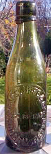 RADCLIFFE & COMPANY CROSS BREWERY EMBOSSED BEER BOTTLE