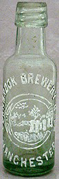 CORNBROOK BREWERY COMPANY LIMITED EMBOSSED BEER BOTTLE