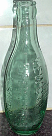 THE NEWCASTLE BREWERIES LIMITED EMBOSSED BEER BOTTLE