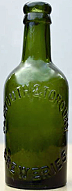 PLYMOUTH AND TORQUAY BREWERIES EMBOSSED BEER BOTTLE