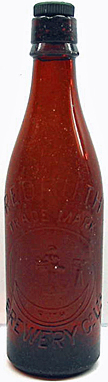 REDRUTH BREWERY COMPANY LIMITED EMBOSSED BEER BOTTLE