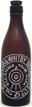THE SCARBORO & WHITBY BREWERIES LIMITED EMBOSSED BEER BOTTLE