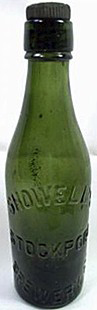 SHOWELL'S BREWERY LIMITED EMBOSSED BEER BOTTLE