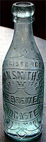 JOHN SMITH'S LIMITED THE BREWERY EMBOSSED BEER BOTTLE