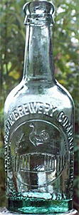 THE WORKINGTON BREWERY COMPANY LIMITED EMBOSSED BEER BOTTLE