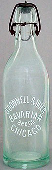 O'DONNELL & DUER BAVARIAN BREWING COMPANY EMBOSSED BEER BOTTLE