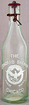 THE STANDARD BREWERY EMBOSSED BEER BOTTLE