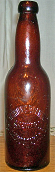 THE HENNING BREWING COMPANY BREWERS EMBOSSED BEER BOTTLE