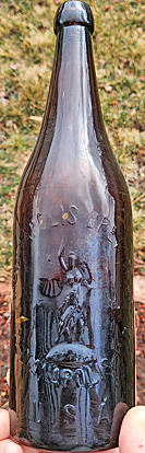 INDIANAPOLIS BREWING COMPANY EMBOSSED BEER BOTTLE