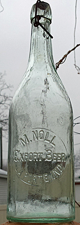 M. NOLL EXPORT BEER EMBOSSED BEER BOTTLE