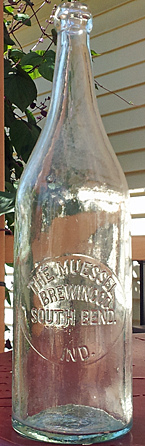 THE MUESSEL BREWING COMPANY EMBOSSED BEER BOTTLE