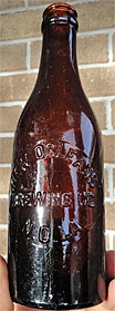 NEW ORLEANS BREWING COMPANY EMBOSSED BEER BOTTLE