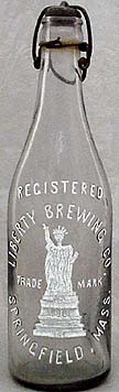 LIBERTY BREWING COMPANY EMBOSSED BEER BOTTLE