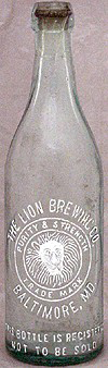 THE LION BREWING COMPANY EMBOSSED BEER BOTTLE