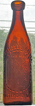 THE NATIONAL BREWERY EMBOSSED BEER BOTTLE