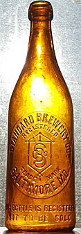 THE STANDARD BREWERY COMPANY EMBOSSED BEER BOTTLE