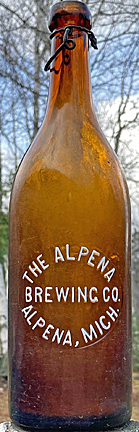 ALPENA BREWING COMPANY EMBOSSED BEER BOTTLE