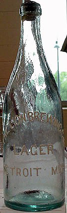 THE LION BREWING COMPANY EMBOSSED BEER BOTTLE