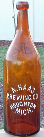 A. HAAS BREWING COMPANY EMBOSSED BEER BOTTLE