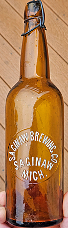SAGINAW BREWING COMPANY EMBOSSED BEER BOTTLE