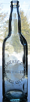 TRAVERSE CITY BREWING COMPANY EMBOSSED BEER BOTTLE