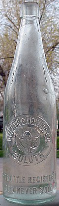 DULUTH BREWING COMPANY EMBOSSED BEER BOTTLE