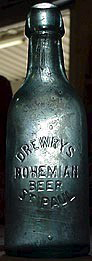 DREWRYS BOHEMIAN BEER EMBOSSED BEER BOTTLE