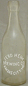 FERD HEIM BREWING COMPANY EMBOSSED BEER BOTTLE