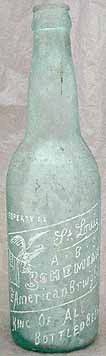THE AMERICAN BREWING COMPANY EMBOSSED BEER BOTTLE