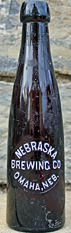 NEBRASKA BREWING COMPANY EMBOSSED BEER BOTTLE