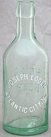 JOSEPH LODER WEISS BEER EMBOSSED BEER BOTTLE